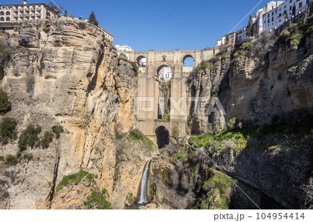 Panoramic view of Puente Nuevo over the Tagus gorge, Ronda, Spain. 104954414