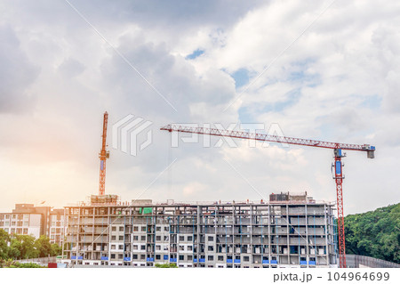 construction new condominium in progress at building site 104964699