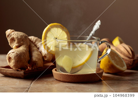 Ginger tea with lemon. Ginger tea with lemon. 104968399