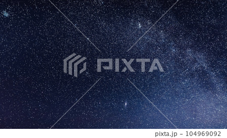 Peak Of Mount Covered With Snow. Amazing Bright Starry Sky Above Mountain Nature Landscape. Glowing Stars And Real Meteoric Track Trail. Night Hyperlapse View. Snow Rock. Mount Kazbek Nature, Georgia Peak Of Mount Covered With Snow. Amazing Bright Starry Sky Above Mountain Nature Landscape. Glowing Stars And Real Meteoric Track Trail. Night Hyperlapse View. Snow Rock. Mount Kazbek Nature, Georgia 104969092