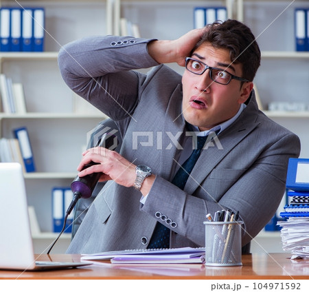 Businessman sweating excessively smelling bad in office at workp Businessman sweating excessively smelling bad in office at workp 104971592