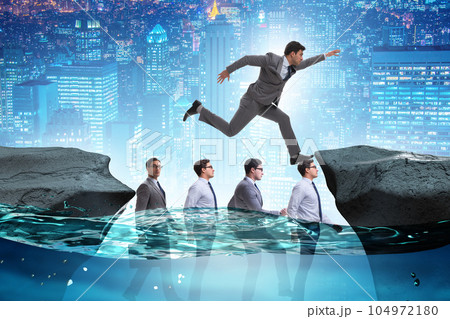 Inequal competition concept with businessman walking on heads 104972180