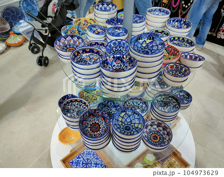 Traditional clay plates on the market of Tunisia. Traditional clay plates on the market of Tunisia. 104973629