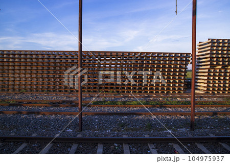 Railway Concrete sleepers stacked under the blue sky for the construction of a new track in Bangladesh Railway Concrete sleepers stacked under the blue sky for the construction of a new track in Bangladesh 104975937