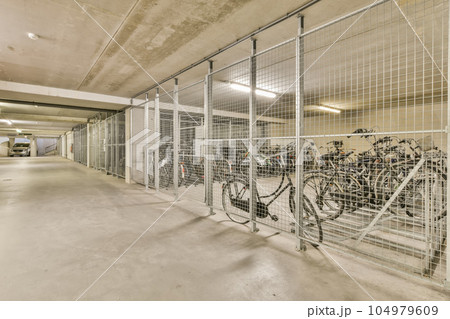 an empty parking with bikes in the middle section of the building photo taken on april 26, 2014 by david mc an empty parking with bikes in the middle section of the building photo taken on april 26, 2014 by david mc 104979609