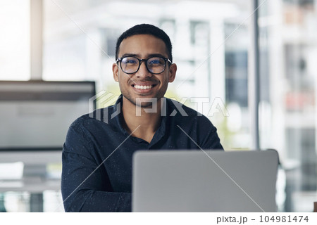 Portrait, laptop and a professional journalist man at work in an editing agency for news reporting. Computer, smile and online content with a happy male editor working in a modern journalism office Portrait, laptop and a professional journalist man at work in an editing agency for news reporting. Computer, smile and online content with a happy male editor working in a modern journalism office 104981474