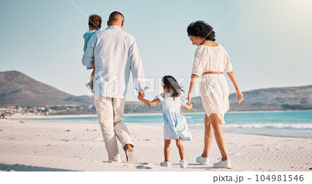 Holding hands, family love and beach walking, bonding or enjoy quality time together for vacation, holiday peace or freedom. Sea water, ocean and back view of travel people in Rio de Janeiro Holding hands, family love and beach walking, bonding or enjoy quality time together for vacation, holiday peace or freedom. Sea water, ocean and back view of travel people in Rio de Janeiro 104981546