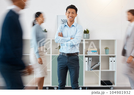 Business, corporate worker and happy asian manager with smile in busy accounting audit company office. Portrait of young businessman, finance employees and management leader with proud arms crossed Business, corporate worker and happy asian manager with smile in busy accounting audit company office. Portrait of young businessman, finance employees and management leader with proud arms crossed 104981932