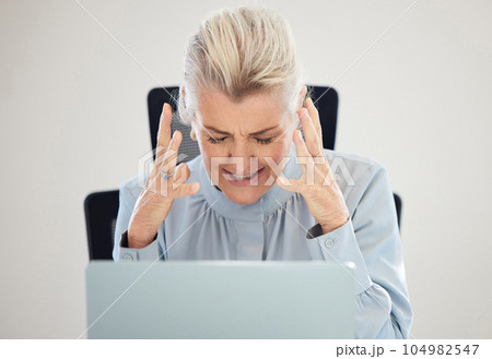 Stress, frustrated and business woman on laptop with anxiety, angry and confused for 404, error or mistake. Crisis, fail and problem of senior person on computer in burnout, depression or work anger 104982547