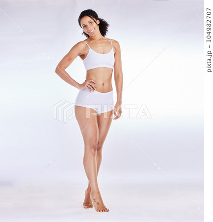 Woman, body or underwear on white background in studio exercise training promotion or Brazilian diet wellness on mockup. Portrait, smile or happy fitness model in lingerie for self love or acceptance Woman, body or underwear on white background in studio exercise training promotion or Brazilian diet wellness on mockup. Portrait, smile or happy fitness model in lingerie for self love or acceptance 104982707
