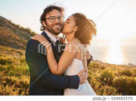 Love, kiss and wedding with couple in nature for celebration, happiness and romance. Sunset, hug and affectionate with man and woman in embrace at countryside for happy, marriage and smile together Love, kiss and wedding with couple in nature for celebration, happiness and romance. Sunset, hug and affectionate with man and woman in embrace at countryside for happy, marriage and smile together 104983579