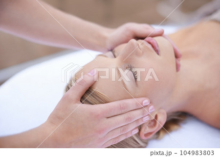 Relax, massage and acupressure on face, woman at spa for health and wellness in luxury skincare treatment. Beauty salon, professional skin care therapist and girl with healthy cosmetic therapy facial 104983803