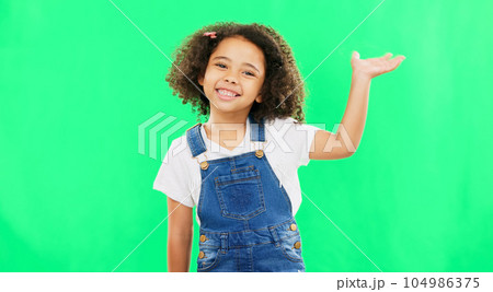 Face, wave and girl greeting, welcome and green screen with happiness, hello and carefree. Portrait, female child and young person with welcome, excited and joyful with hi, facial expression or smile 104986375
