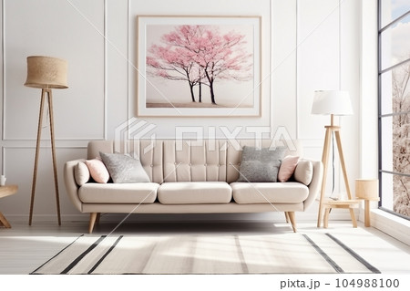 interior design, Beige couch standing against white wall with molding and watercolor poster in cozy living room interior. interior design, Beige couch standing against white wall with molding and watercolor poster in cozy living room interior. 104988100