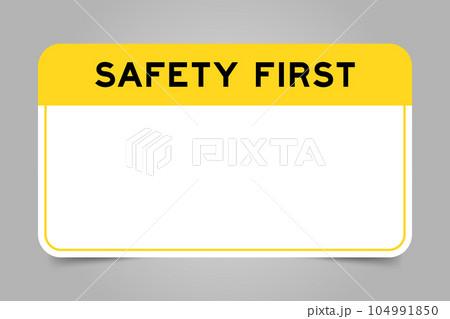 Label banner that have yellow headline with word safety first and white copy space, on gray background Label banner that have yellow headline with word safety first and white copy space, on gray background 104991850
