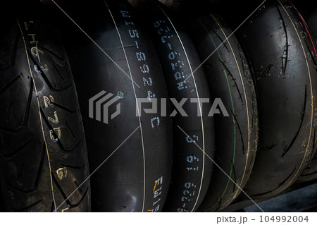 Tyre shop for sale in the store. Sale of car tires. Tyre shop for sale in the store. Sale of car tires. 104992004