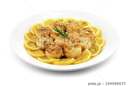 Scalloped Lemon garlic Butter Sauce Grilled Scalloped Lemon garlic Butter Sauce Grilled 104996075