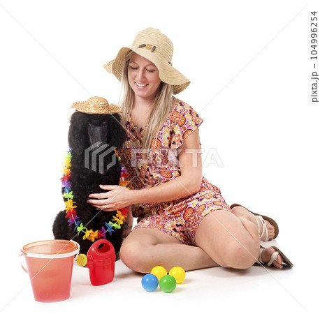 standard poodle and woman standard poodle and woman 104996254