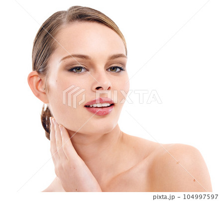 Skincare, salon and portrait of woman in studio for wellness, dermatology and facial treatment. Spa, aesthetic and hands on face of girl with cosmetics, makeup and beauty products on white background 104997597