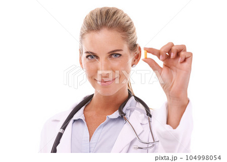 Portrait, pills and healthcare with a doctor woman in studio on a white background for health or insurance. Medical, tablet and pharmaceutical product with a female pharmacist holding medicine Portrait, pills and healthcare with a doctor woman in studio on a white background for health or insurance. Medical, tablet and pharmaceutical product with a female pharmacist holding medicine 104998054