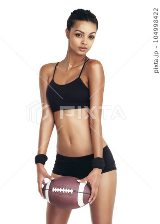 Sports health, portrait and black woman with football for exercise fitness, competition game or performance challenge. Cardio, studio workout or training football player isolated on white background 104998422