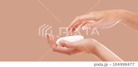 Skincare, soap and zoom on washing hands on studio background mockup, product placement and advertising. Cleaning, hygiene and protection from germs, bacteria and organic natural skin care safety. Skincare, soap and zoom on washing hands on studio background mockup, product placement and advertising. Cleaning, hygiene and protection from germs, bacteria and organic natural skin care safety. 104998477
