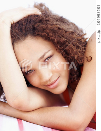 Sexy and cute. Relax, smile and happy with portrait of woman for confidence, positive and pride. Happiness, natural and carefree with face of female smiling for cheerful, calm and peaceful on break. Sexy and cute. Relax, smile and happy with portrait of woman for confidence, positive and pride. Happiness, natural and carefree with face of female smiling for cheerful, calm and peaceful on break. 104998505