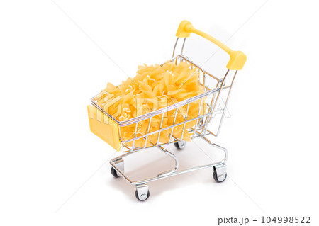 Uncooked Fusilli Pasta in Small Shopping Cart Isolated on White 104998522