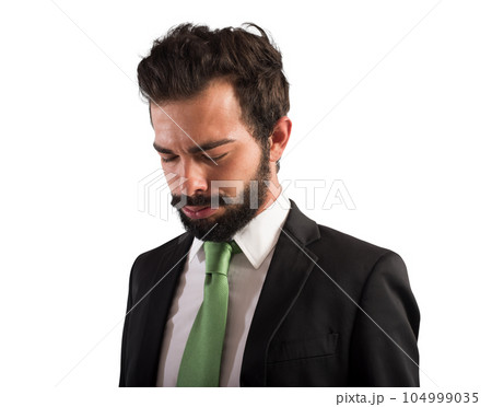 Tired businessman is exhausted due to overworked Tired businessman is exhausted due to overworked 104999035