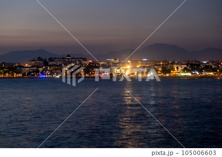 Night city. Alanya, Turkey. Beautiful lights of night city. View of Alanya harbor form Alanya peninsula. Turkish Riviera by night. Night city. Alanya, Turkey. Beautiful lights of night city. View of Alanya harbor form Alanya peninsula. Turkish Riviera by night. 105006603