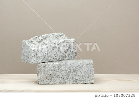 Stone Podium for promotion on beige Background. Natural pedestal. Two stone podiums. Beauty product mockup. Scene to show products. Showcase, display case. Front View, soft shadow Stone Podium for promotion on beige Background. Natural pedestal. Two stone podiums. Beauty product mockup. Scene to show products. Showcase, display case. Front View, soft shadow 105007229