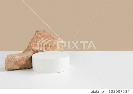 Podium for cosmetic product presentation. Minimal geometrical form and natural Stone. Cylinder sphere, geometric circle scene, soft shadow. Front view Podium for cosmetic product presentation. Minimal geometrical form and natural Stone. Cylinder sphere, geometric circle scene, soft shadow. Front view 105007334