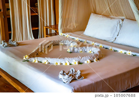 Bedroom inside a cabin on the beach in Haad Tien Beach in shark bay, koh Tao, Thailand 105007688