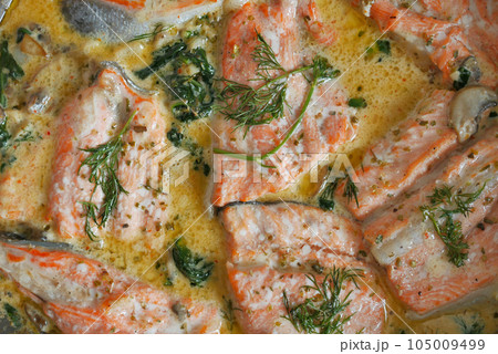 baked salmon fish in a large bowl baked salmon fish in a large bowl 105009499