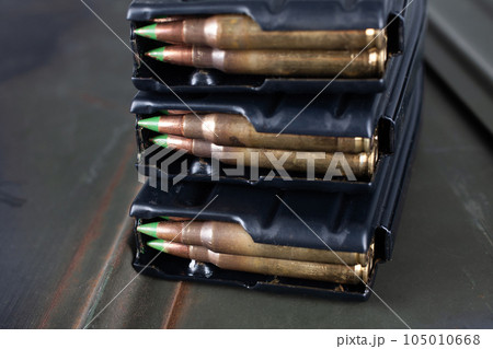5.56*45mm cartridges with standard lead core bullets with steel penetrator loaded in magazines 5.56*45mm cartridges with standard lead core bullets with steel penetrator loaded in magazines 105010668
