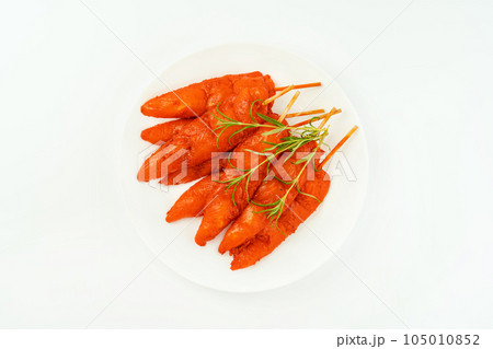 Fresh raw marinated chicken meat skewers iner fillet on a white background.Top view.Copy space. Fresh raw marinated chicken meat skewers iner fillet on a white background.Top view.Copy space. 105010852