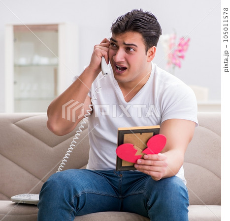 Young man in sad saint valentine concept Young man in sad saint valentine concept 105011578