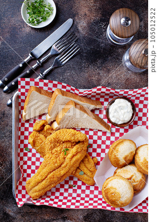 Fried catfish with cornbread Fried catfish with cornbread 105012522