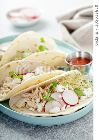 Healthy tacos with shredded chicken Healthy tacos with shredded chicken 105012630