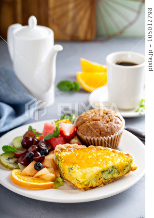Healthy and filling breakfast with quiche 105012798