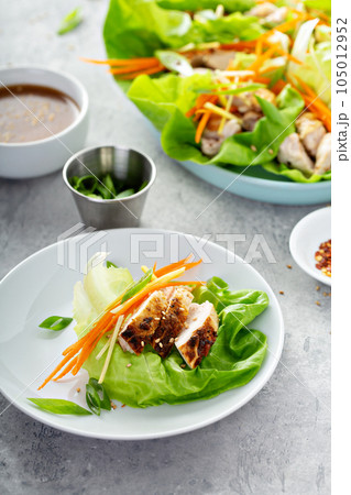 Asian grilled chicken ginger lettuce wraps 105012952
