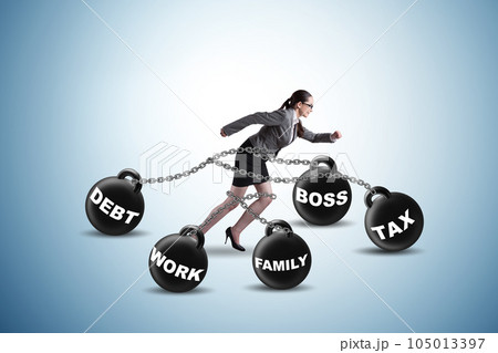 Businesswoman struggling with many priorities in her life 105013397