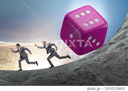 Uncertainty concept with businessman and dice 105013663