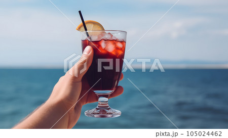 caucasian hand holding glass of red fruit cocktail on blurry sea horizon background at sunny day, neural network generated image caucasian hand holding glass of red fruit cocktail on blurry sea horizon background at sunny day, neural network generated image 105024462