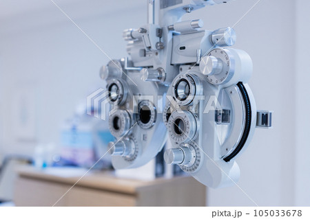 Phoropter eyesight measurement testing machine, Eye health check and ophthalmology concept. Phoropter eyesight measurement testing machine, Eye health check and ophthalmology concept. 105033678