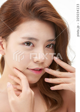 Beauty, a clean-skinned young woman Beauty, a clean-skinned young woman 105034133