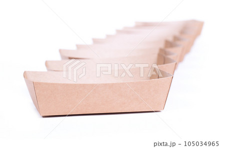 Recycled paper trays for snacks, isolated on white Recycled paper trays for snacks, isolated on white 105034965