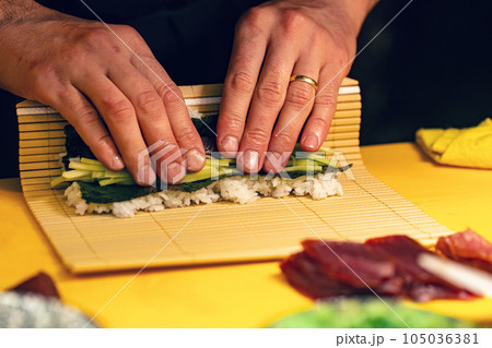 Chef making sushi Chef making sushi 105036381