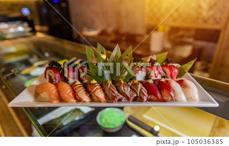 Various sushi on white plate 105036385