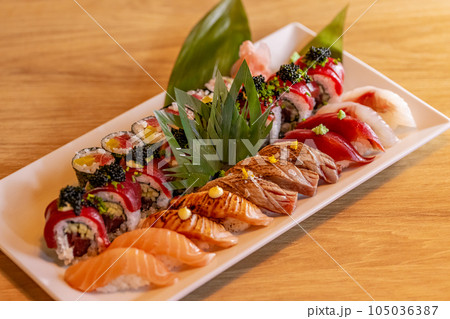 Sushi set on a white plate Sushi set on a white plate 105036387